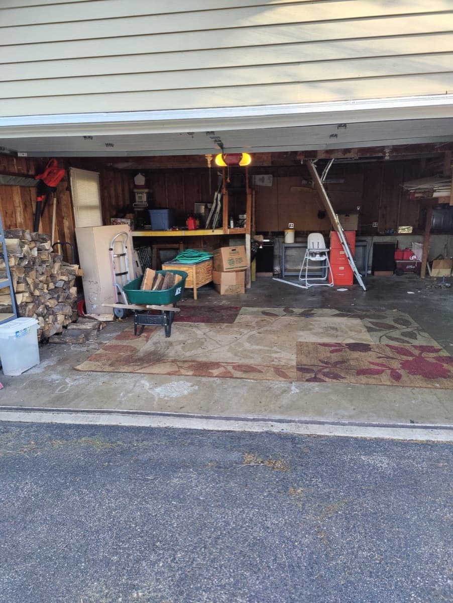 Garage filled with household contents before ECOS began work