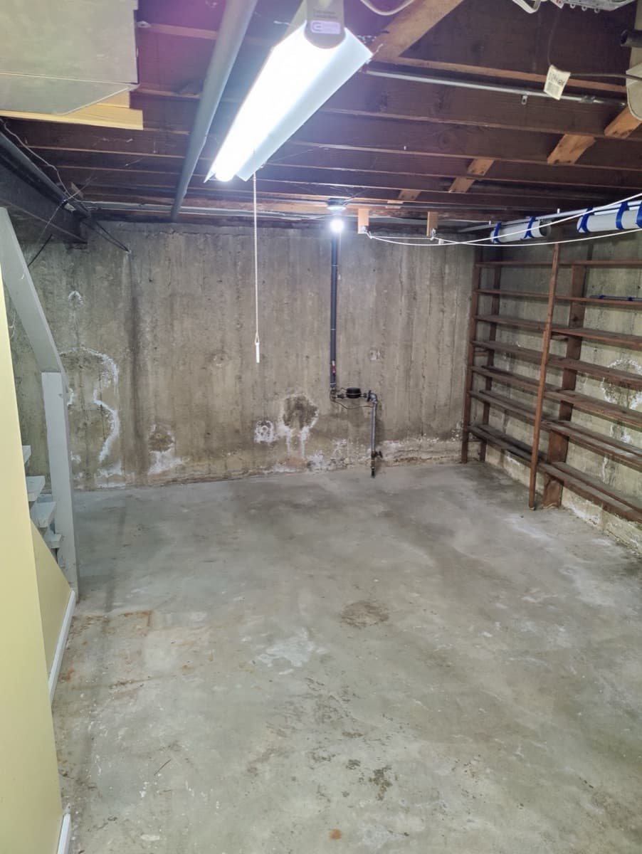 The same storage shelves cleared after the property transition